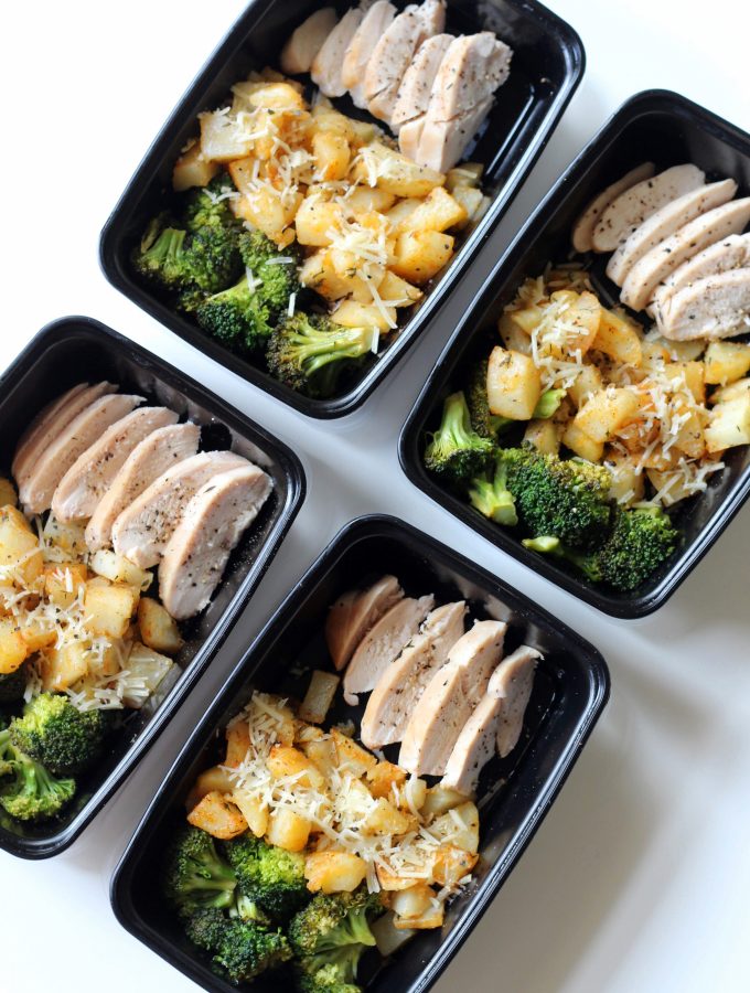 Containers with chicken, diced potatoes, and broccoli.